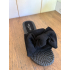 Zwarte slipper met strik
